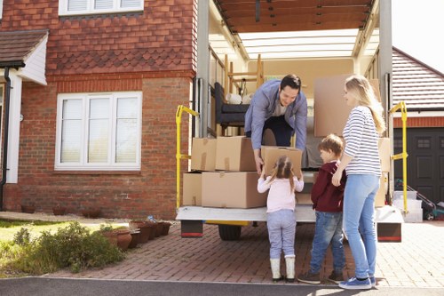 Removal team preparing a moving van for a Manor House property