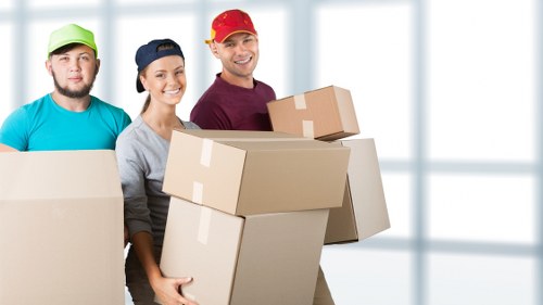Packed boxes and furniture ready for local removals in Manor House