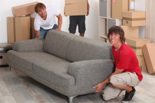 Removal team loading items near a North London home