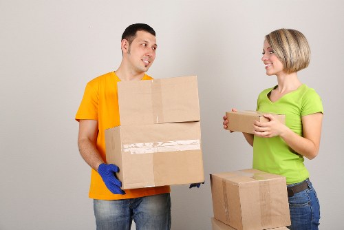 Manor House moving day with removal van and packed belongings