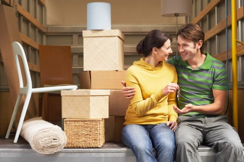Movers handling an apartment relocation in Manor House