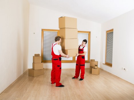 Furniture and household items loaded into a van for transport in Manor House